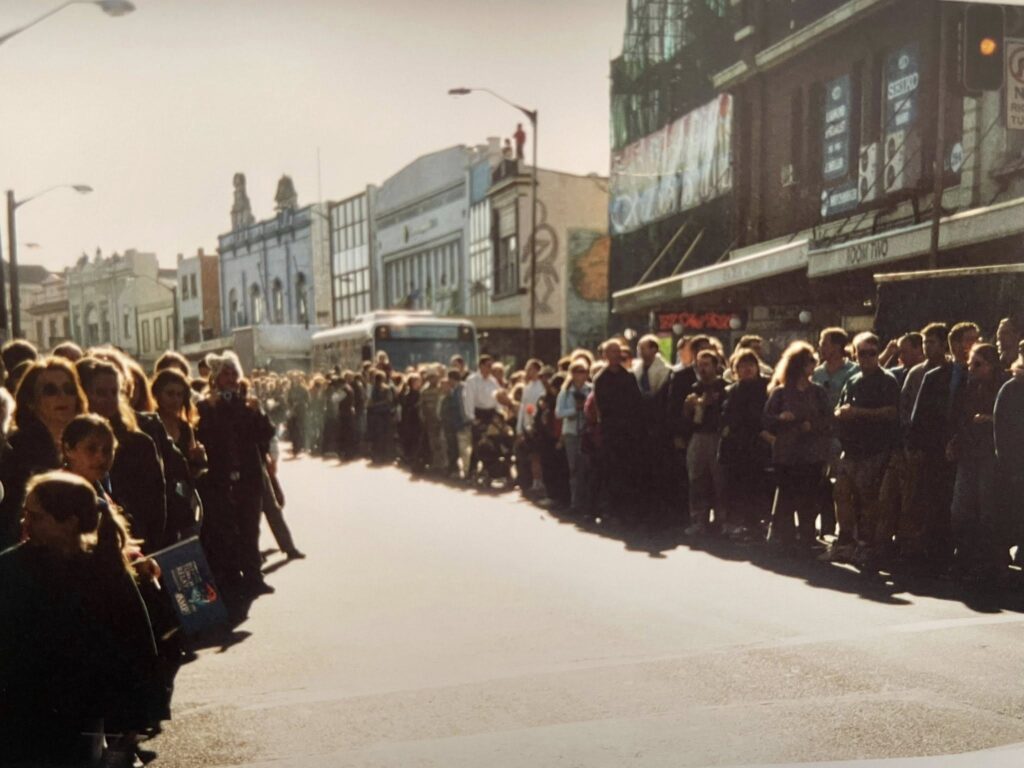 King Street lined with people waiting to see the Olympic flame in the year 2000.