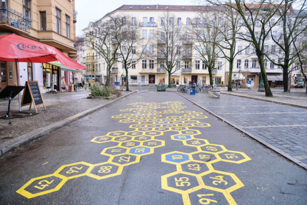 Street with numbers painted o the road in a honeycomb pattern